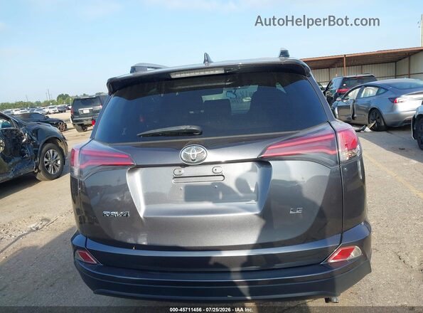 JTMZFREVXGD089531 2016 TOYOTA RAV4 Gray 