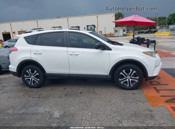 JTMZFREVXJJ152121 2018 TOYOTA RAV4 Белый Вид задней части салона