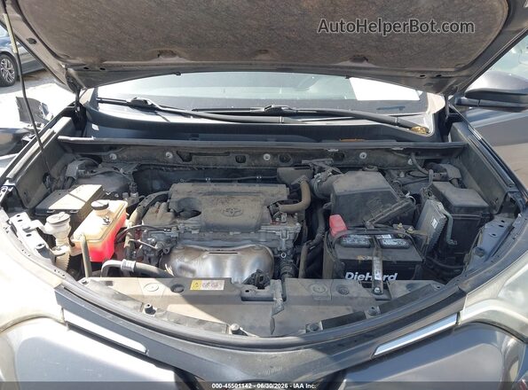 JTMZFREVXJJ155553 2018 TOYOTA RAV4 Gray Rear view