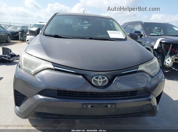 JTMZFREVXJJ155553 2018 TOYOTA RAV4 Gray Rear interior view