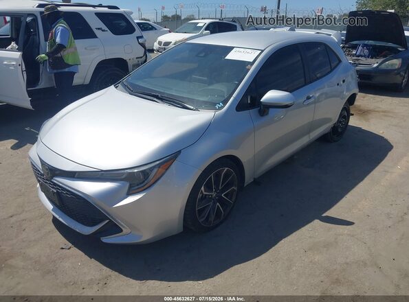JTNA4RBE9L3095856 2020 TOYOTA COROLLA Silver Front left
