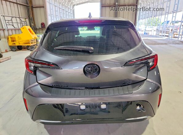 JTNC4MBE9P3206570 2023 TOYOTA COROLLA Gray Vista trasera