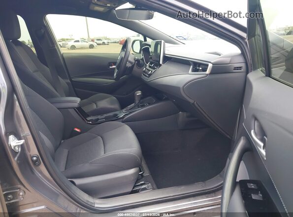 JTND4MBE1S3250981 2025 TOYOTA COROLLA Серый Вид салона спереди