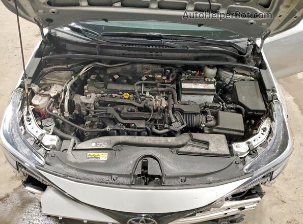 JTND4MBE2R3222049 2024 TOYOTA COROLLA Silver Vista interior trasera