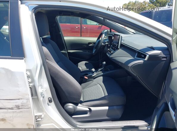 JTND4MBE3M3107226 2021 TOYOTA COROLLA Silver Front interior view
