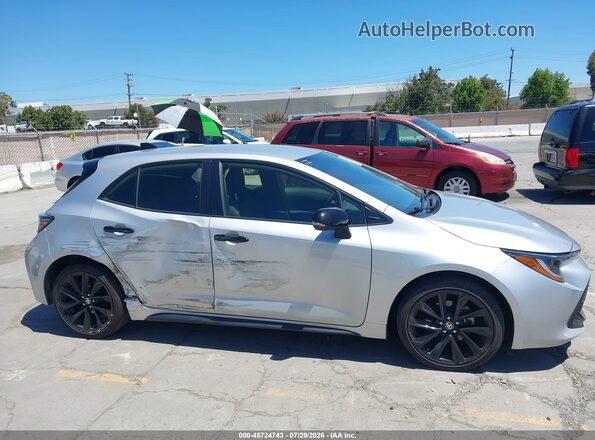 JTND4MBE3M3107226 2021 TOYOTA COROLLA Silver Rear interior view