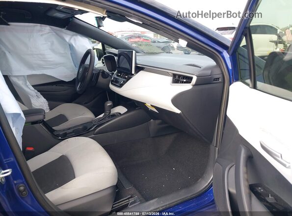 JTND4MBE3T3262566 2026 TOYOTA COROLLA Blue Widok wnętrza z przodu