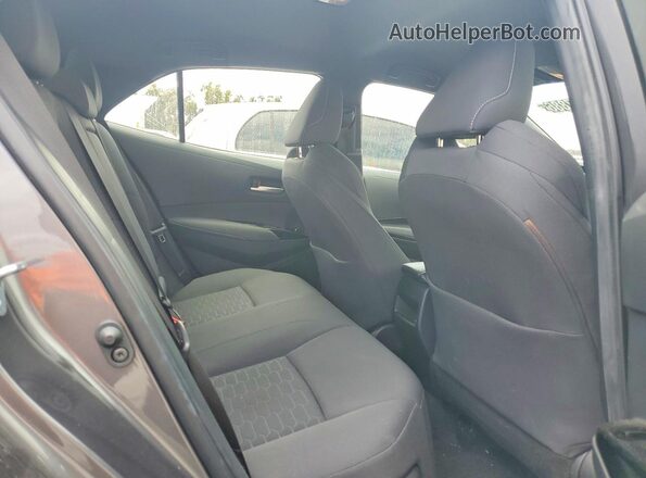 JTND4MBE5M3122424 2021 TOYOTA COROLLA Black Rear seats view