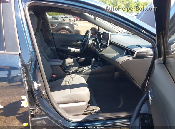 JTND4MBE5M3140339 2021 TOYOTA COROLLA Dark Blue Вид салона спереди