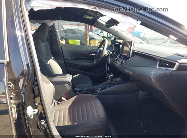 JTND4MBE5R3231263 2024 TOYOTA COROLLA Black Front interior view