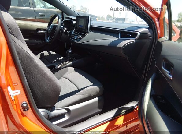 JTND4MBE8T3257153 2026 TOYOTA COROLLA Orange Widok wnętrza z przodu