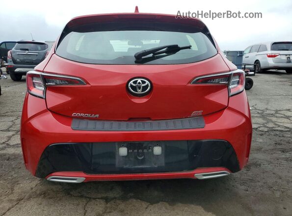 JTND4MBE9M3115864 2021 TOYOTA COROLLA Red Rear view