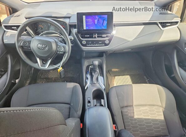JTND4MBE9P3208808 2023 TOYOTA COROLLA Gray Dashboard view