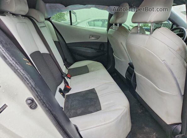 JTNK4RBE1K3049313 2019 TOYOTA COROLLA White Vista de los asientos traseros