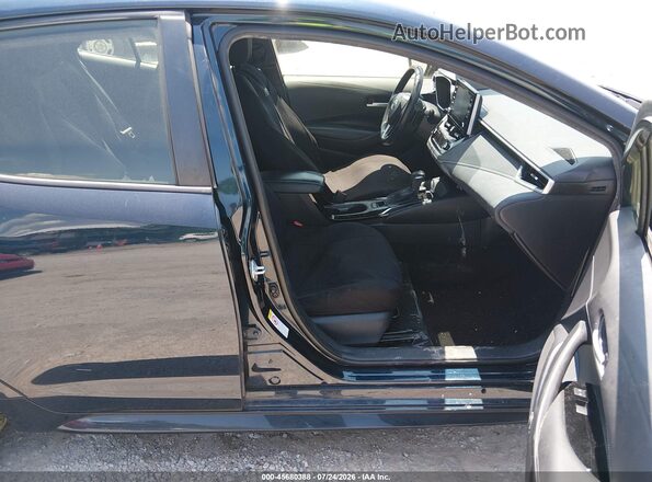 JTNK4RBE2K3028678 2019 TOYOTA COROLLA Blue Front interior view