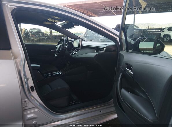 JTNK4RBE2K3054911 2019 TOYOTA COROLLA Silver Вид салону спереду