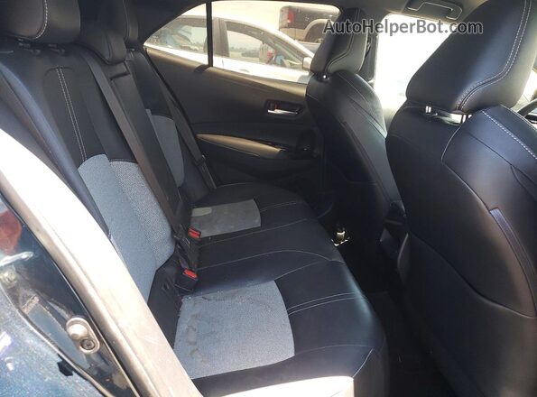 JTNK4RBE3K3050933 2019 TOYOTA COROLLA Teal Widok tylnych siedzeń