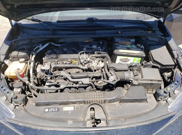 JTNK4RBE3K3050933 2019 TOYOTA COROLLA Teal Widok wnętrza z tyłu
