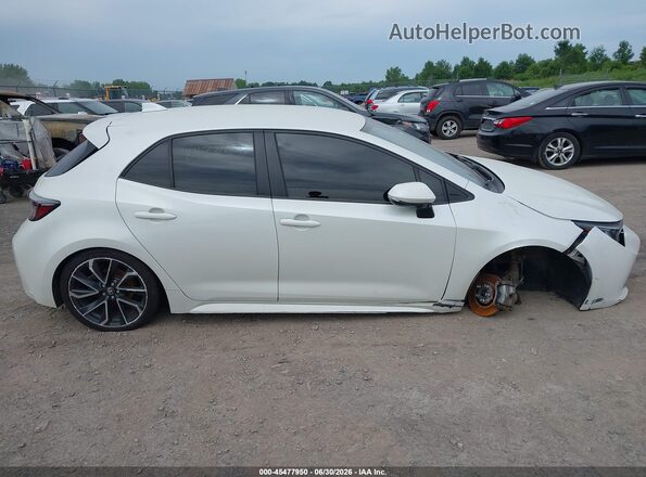 JTNK4RBE4K3056899 2019 TOYOTA COROLLA White Widok wnętrza z tyłu