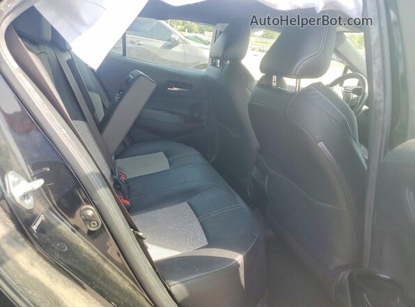 JTNK4RBEXK3041730 2019 TOYOTA COROLLA Black Widok tylnych siedzeń