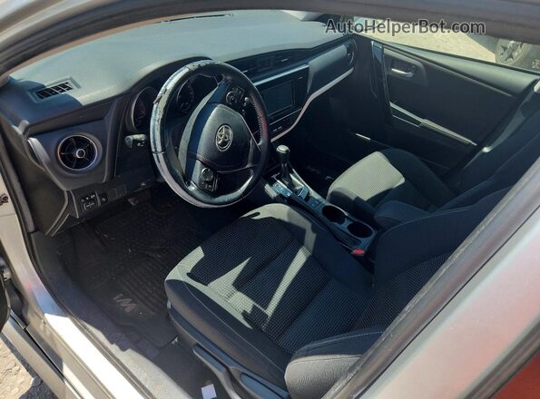 JTNKARJEXHJ543099 2017 TOYOTA COROLLA Silver Вид панелі приладів