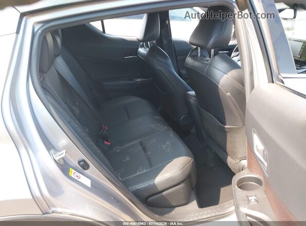 JTNKHMBX2K1061037 2019 TOYOTA C-HR Silver VIN კოდის სტიკერის ხედი