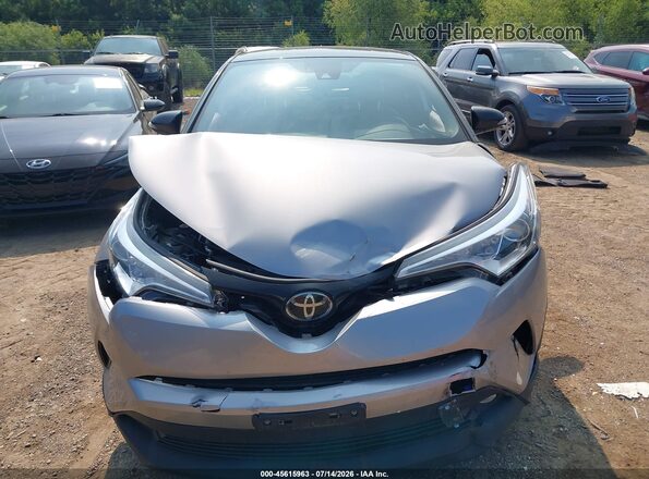 JTNKHMBX2K1061037 2019 TOYOTA C-HR Silver ხელსაწყოთა პანელის ხედი