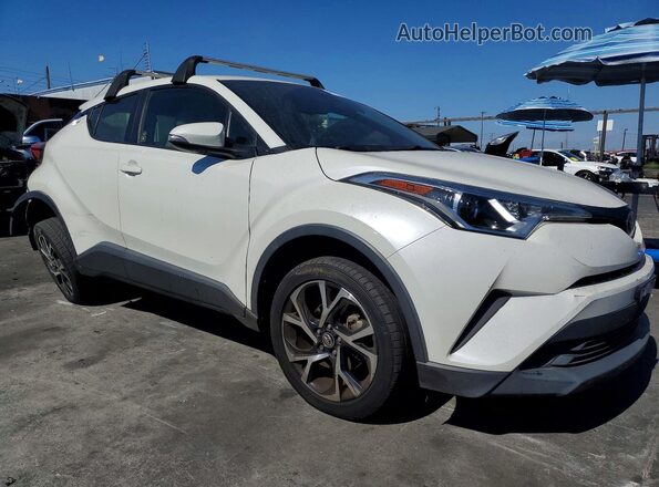 JTNKHMBX3K1012722 2019 TOYOTA C-HR White Front right