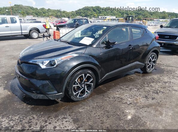 JTNKHMBX5K1054437 2019 TOYOTA C-HR Black Front left
