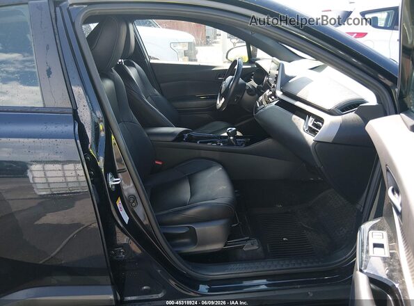 JTNKHMBX5K1054437 2019 TOYOTA C-HR Black Front interior view