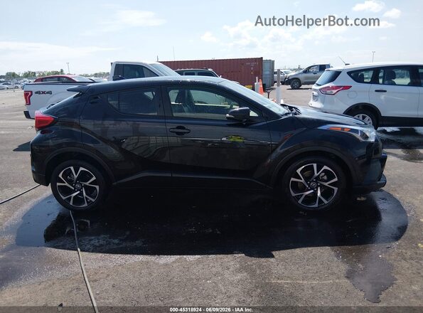 JTNKHMBX5K1054437 2019 TOYOTA C-HR Black Rear interior view