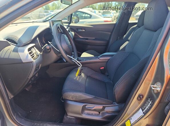 JTNKHMBX7M1119100 2021 TOYOTA C-HR Green Widok wnętrza z przodu