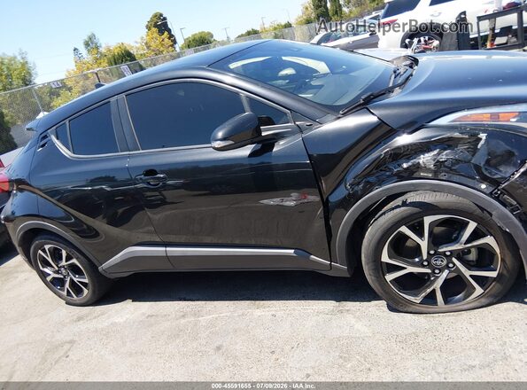 JTNKHMBX9J1007989 2018 TOYOTA C-HR Black Widok wnętrza z tyłu
