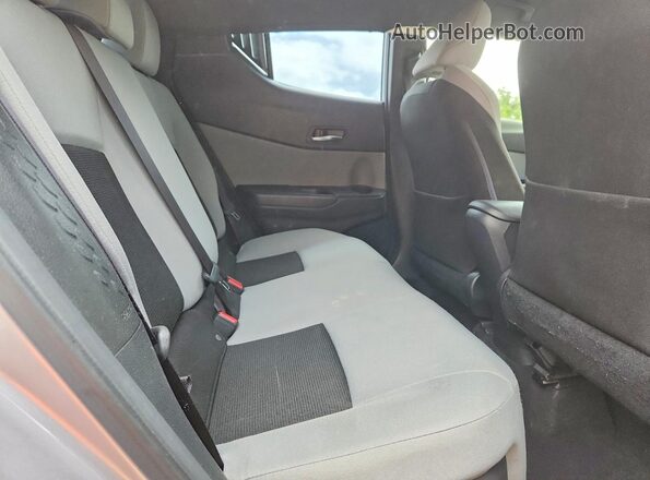 JTNKHMBX9K1031212 2019 TOYOTA C-HR Серебряный Вид задней части салона