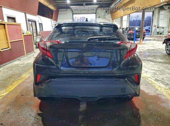 JTNKHMBXXM1126641 2021 TOYOTA C-HR Black Rear view