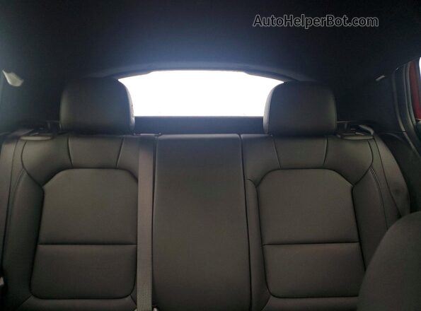 KL47LBE23RB192117 2024 BUICK OTHER Red Vista de los asientos traseros
