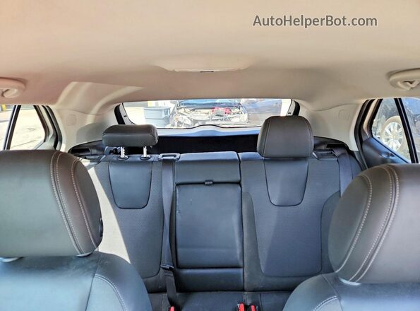 KL4AMCSL5RB003358 2024 BUICK ENCORE Maroon Rear seats view