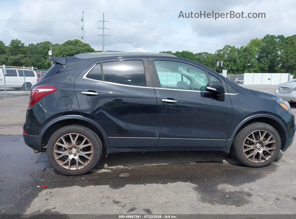 KL4CJ1SB2JB663763 2018 BUICK ENCORE Black Vista interior trasera