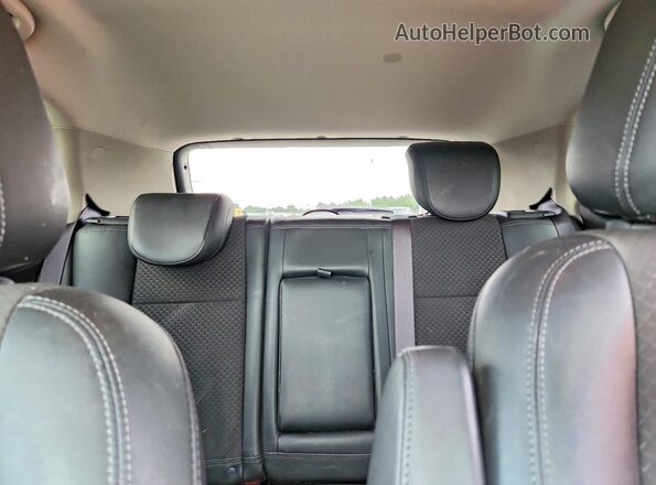 KL4CJASB3JB569424 2018 BUICK ENCORE Red Rear seats view
