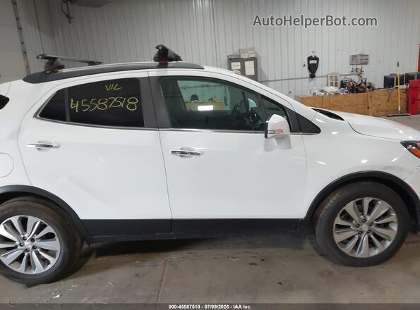KL4CJASB9JB508286 2018 BUICK ENCORE White Widok wnętrza z tyłu