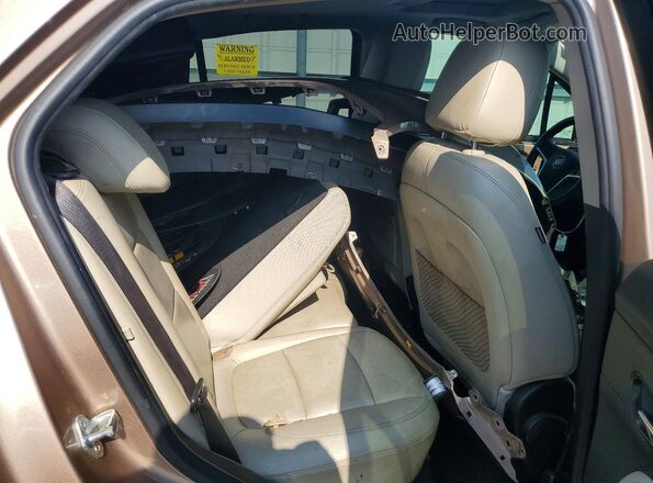 KL4CJCSB7JB709440 2018 BUICK ENCORE Tan Widok wnętrza z tyłu
