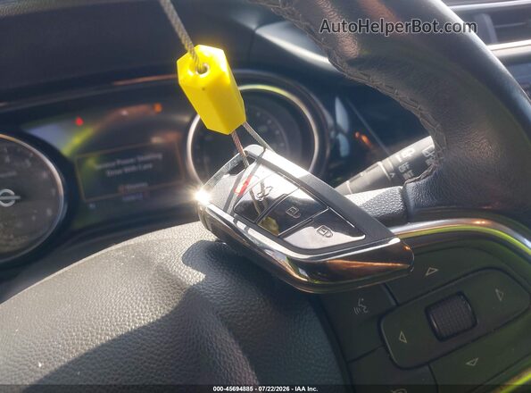 KL4MMDSL4MB142375 2021 BUICK ENCORE Burgundy Dashboard view