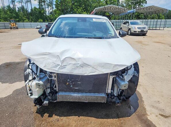 KL77LFE23RC024675 2024 CHEVROLET TRAX White Front view