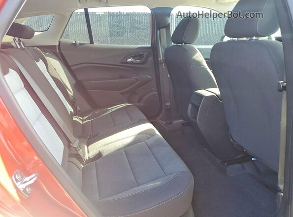 KL77LFE2XRC051100 2024 CHEVROLET TRAX Orange Vista interior trasera