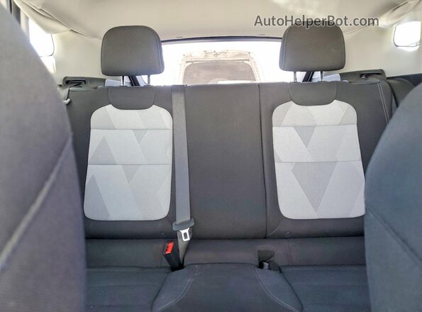 KL77LFEP5SC196577 2025 CHEVROLET TRAX White Vista de los asientos traseros