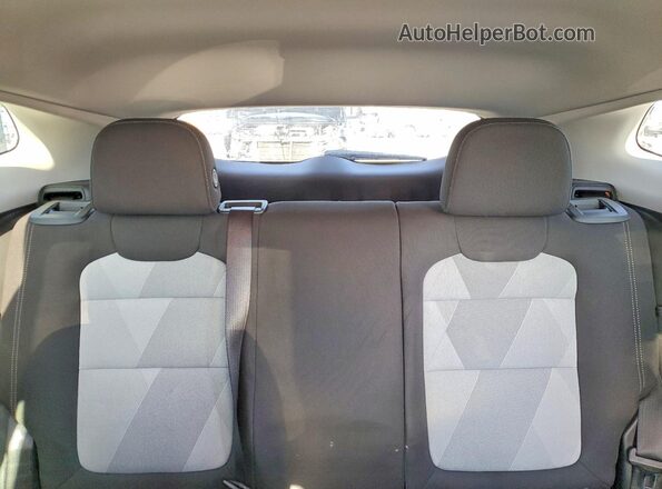 KL77LFEPXSC106744 2025 CHEVROLET TRAX White Vista de los asientos traseros