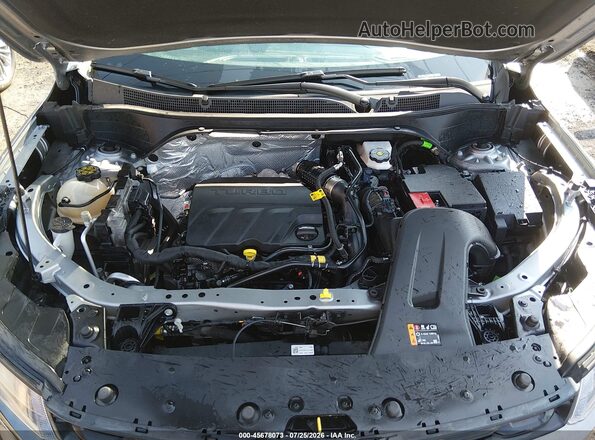 KL77LGE22RC192393 2024 CHEVROLET TRAX Серый Вид сзади