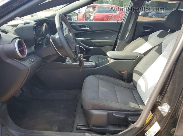 KL77LGEP8SC256647 2025 CHEVROLET TRAX Черный Вид салона спереди