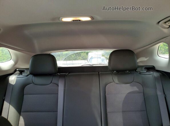 KL77LHE24RC242927 2024 CHEVROLET TRAX Red Հետևի նստատեղերի տեսք