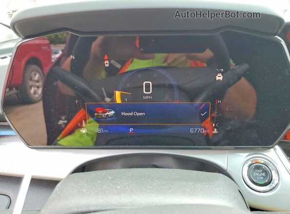 KL77LHE24RC242927 2024 CHEVROLET TRAX Red Սարքավորումների վահանակի տեսք